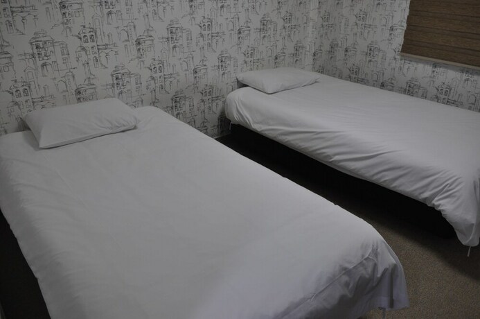 Imagen de la habitación del Hotel Manhattan, Jeju. Foto 15