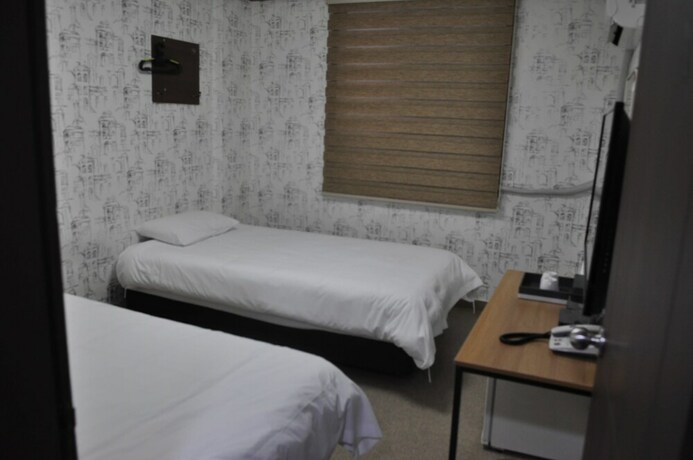Imagen de la habitación del Hotel Manhattan, Jeju. Foto 16