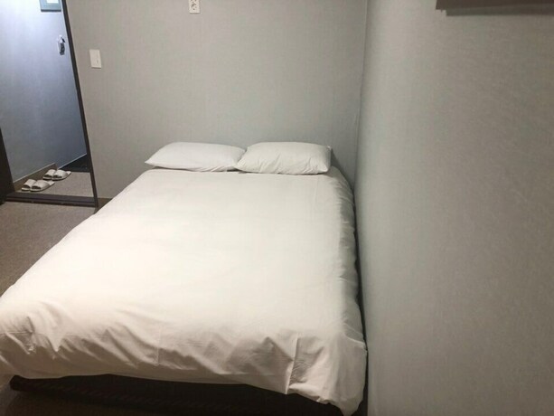 Imagen de la habitación del Hotel Manhattan, Jeju. Foto 18