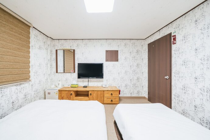 Imagen de la habitación del Hotel Manhattan, Jeju. Foto 28