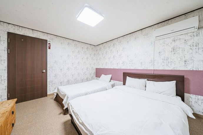 Imagen de la habitación del Hotel Manhattan, Jeju. Foto 30