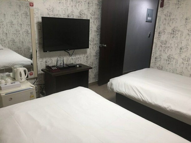 Imagen de la habitación del Hotel Manhattan, Jeju. Foto 31