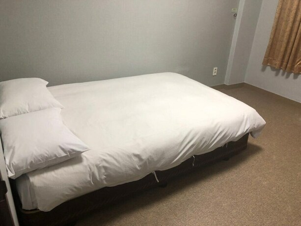 Imagen de la habitación del Hotel Manhattan, Jeju. Foto 33