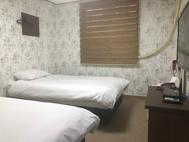 Imagen de la habitación del Hotel Manhattan, Jeju. Foto 34
