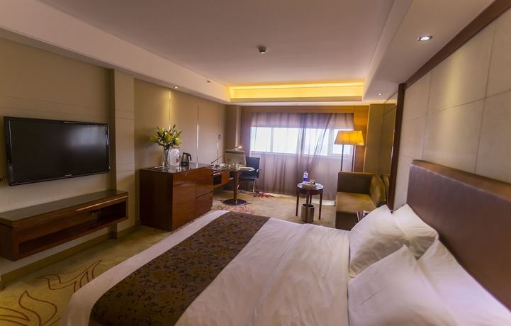 Imagen de la habitación del Hotel Manhattan Kinlen - Shishi. Foto 7