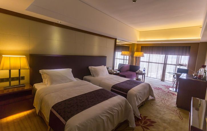 Imagen de la habitación del Hotel Manhattan Kinlen - Shishi. Foto 15