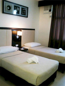 Imagen de la habitación del Hotel Manhattan Suites Inn. Foto 2