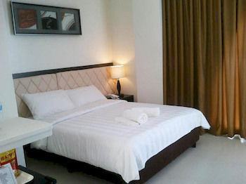 Imagen de la habitación del Hotel Manhattan Suites Inn. Foto 4