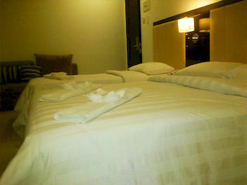 Imagen de la habitación del Hotel Manhattan Suites Inn. Foto 6