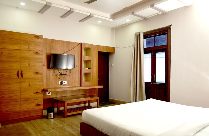 Imagen de la habitación del Hotel Mani, Ujjain. Foto 2