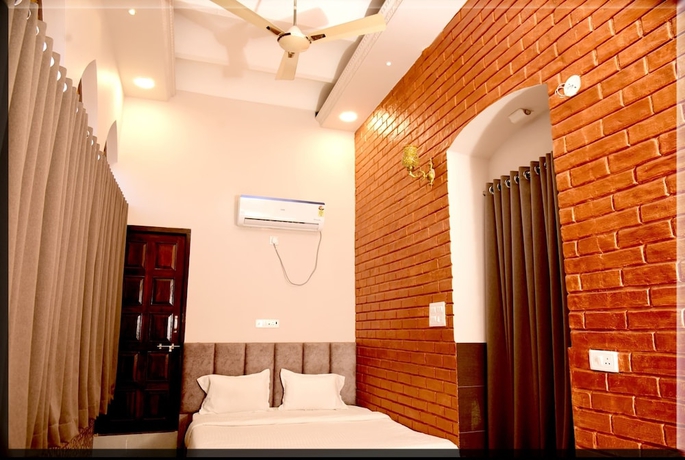 Imagen de la habitación del Hotel Mani, Ujjain. Foto 6