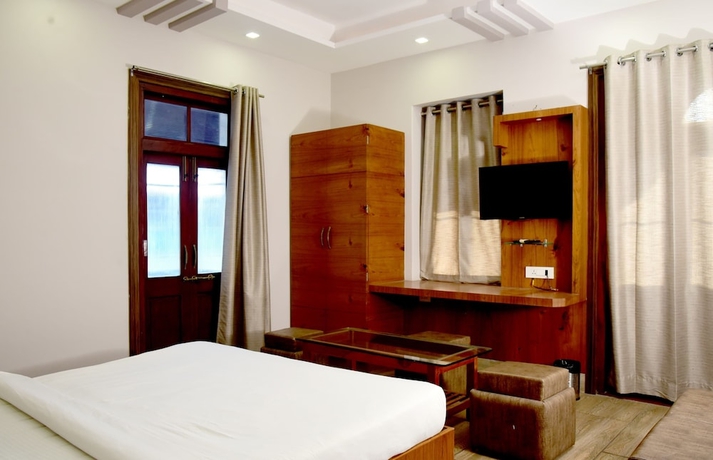 Imagen de la habitación del Hotel Mani, Ujjain. Foto 7