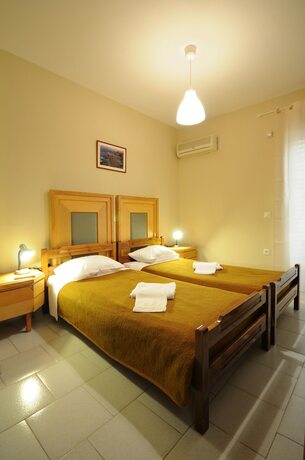 Imagen de la habitación del Hotel Manias Apartments. Foto 16