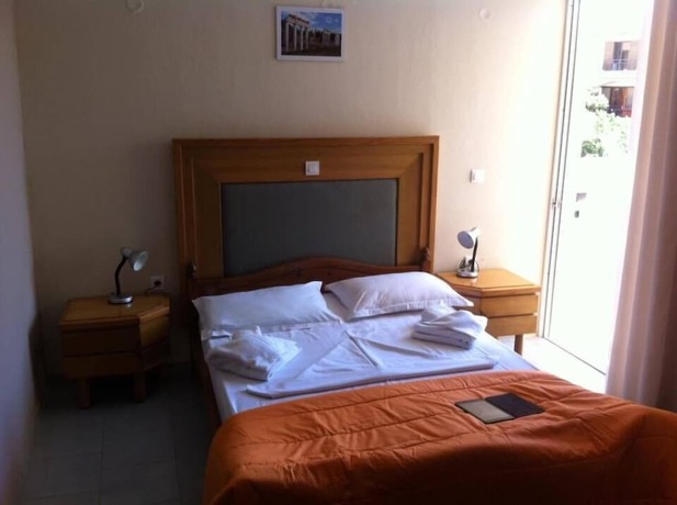 Imagen de la habitación del Hotel Manias Apartments. Foto 18