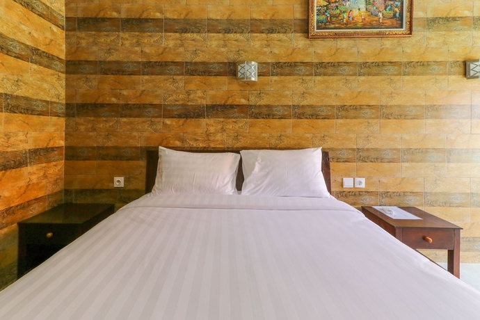 Imagen de la habitación del Hotel Manik Homestay. Foto 6