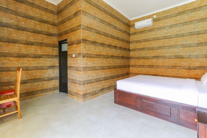 Imagen de la habitación del Hotel Manik Homestay. Foto 7