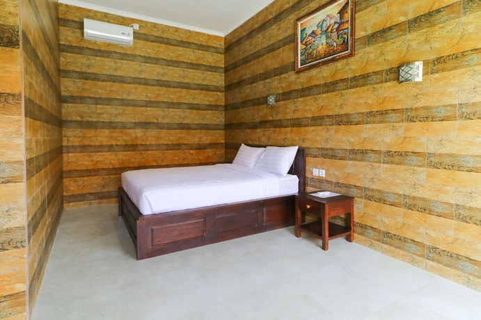 Imagen de la habitación del Hotel Manik Homestay. Foto 8