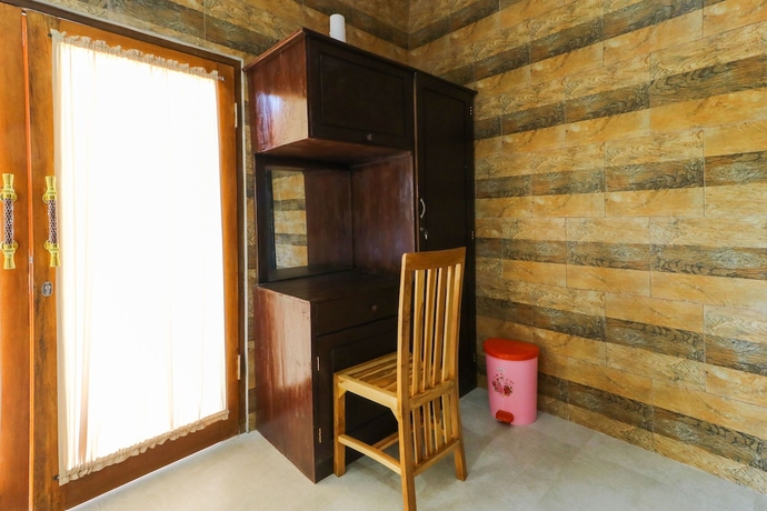 Imagen de la habitación del Hotel Manik Homestay. Foto 9