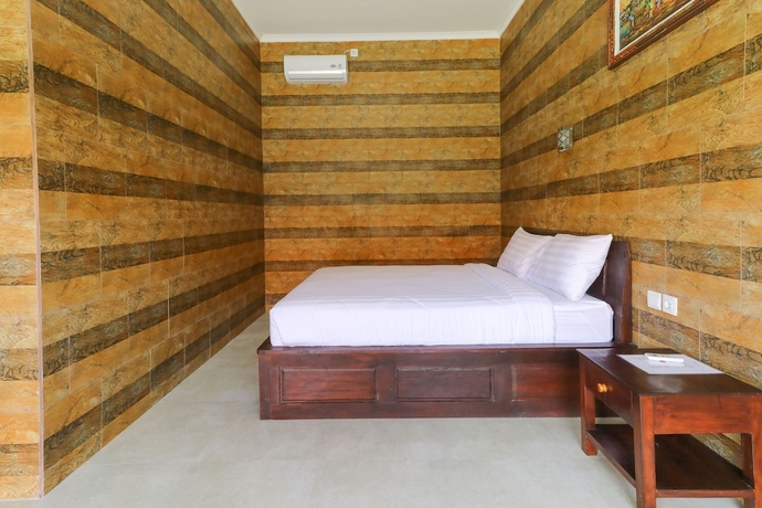 Imagen de la habitación del Hotel Manik Homestay. Foto 11