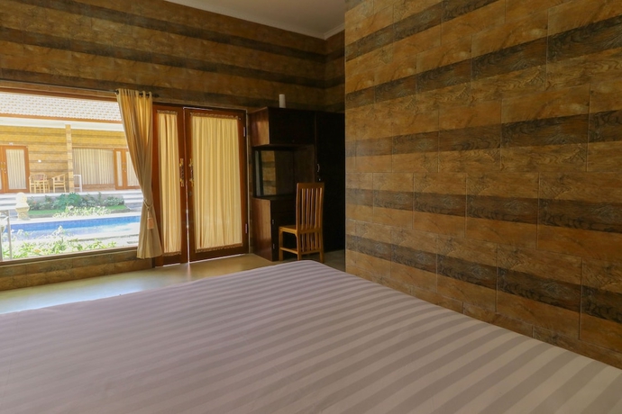 Imagen de la habitación del Hotel Manik Homestay. Foto 12