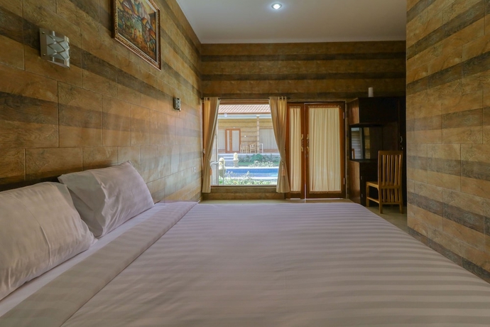 Imagen de la habitación del Hotel Manik Homestay. Foto 15