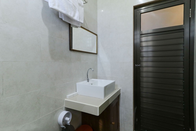 Imagen de la habitación del Hotel Manik Homestay. Foto 18