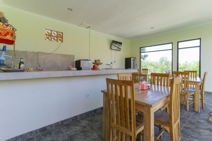 Imagen del bar/restaurante del Hotel Manik Homestay. Foto 2