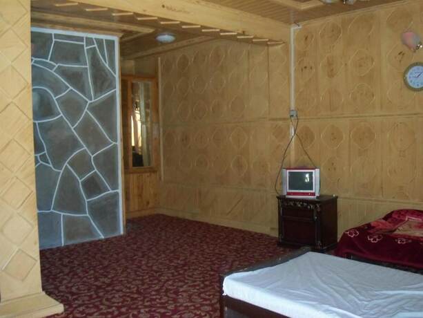 Imagen de la habitación del Hotel Manila Huts Naran. Foto 18