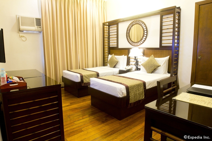 Imagen de la habitación del Hotel Manila Lotus. Foto 3