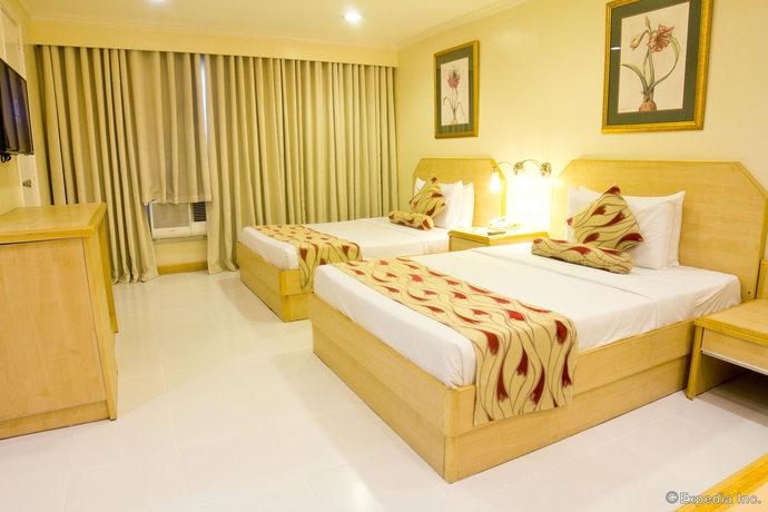 Imagen de la habitación del Hotel Manila Lotus. Foto 10