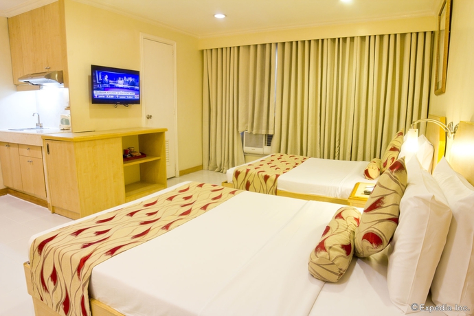 Imagen de la habitación del Hotel Manila Lotus. Foto 11