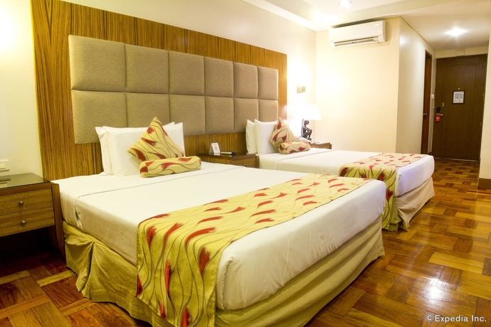 Imagen de la habitación del Hotel Manila Lotus. Foto 14