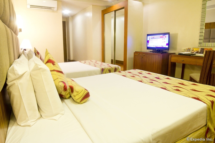 Imagen de la habitación del Hotel Manila Lotus. Foto 15