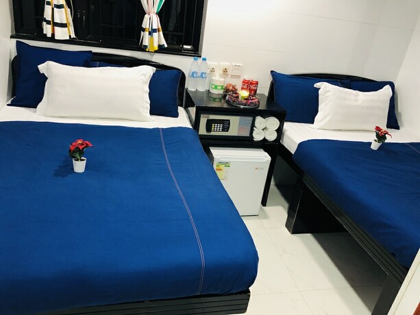 Imagen de la habitación del Hotel Manila Lounge, Kowloon. Foto 16