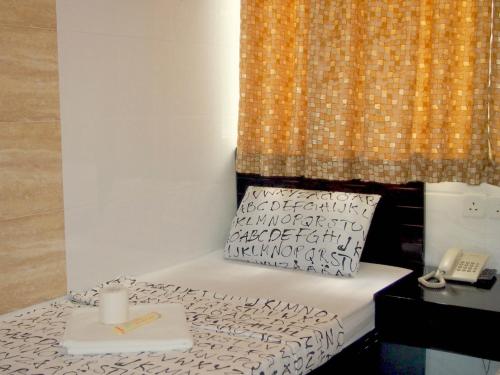 Imagen de la habitación del Hotel Manila Lounge, Kowloon. Foto 5