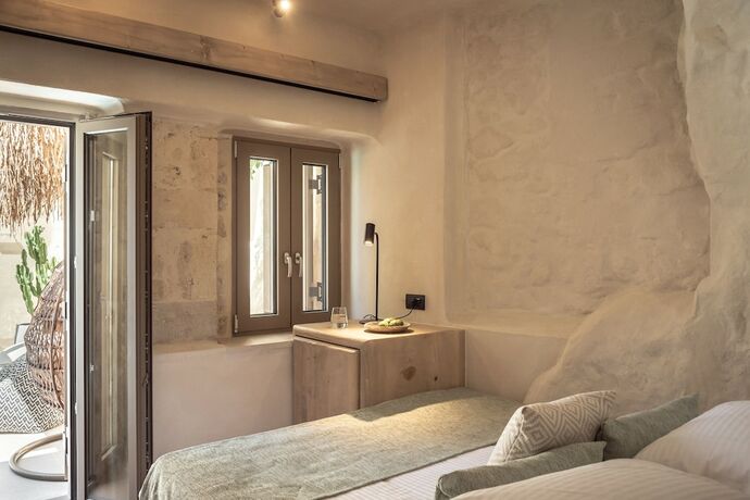 Imagen de la habitación del Hotel Manili Boutique Suites and Villas. Foto 14