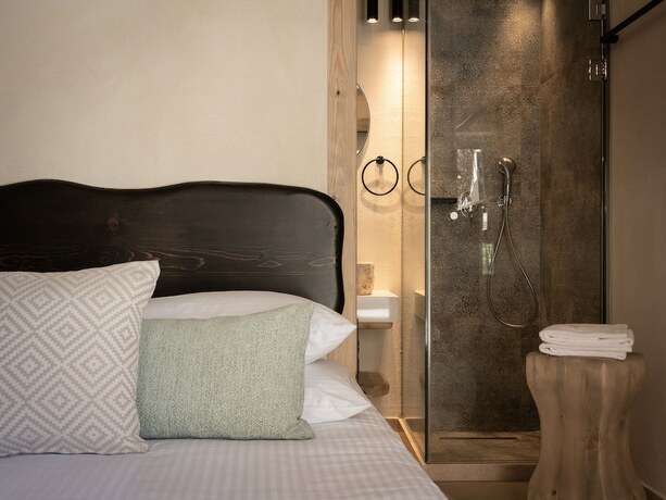 Imagen de la habitación del Hotel Manili Boutique Suites and Villas. Foto 15