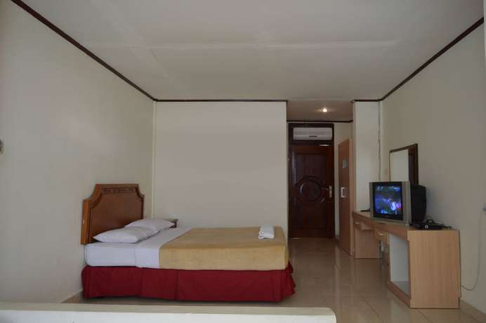 Imagen de la habitación del Hotel Maninjau Indah. Foto 2
