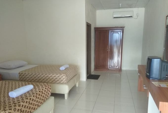 Imagen de la habitación del Hotel Maninjau Indah. Foto 3