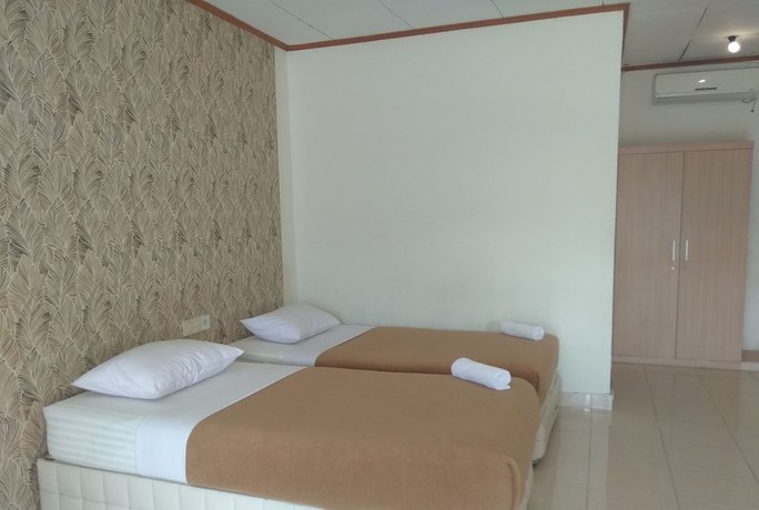 Imagen de la habitación del Hotel Maninjau Indah. Foto 4