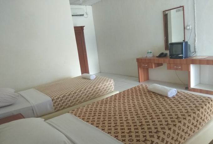 Imagen de la habitación del Hotel Maninjau Indah. Foto 5