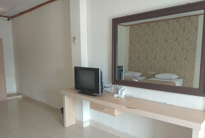 Imagen de la habitación del Hotel Maninjau Indah. Foto 6