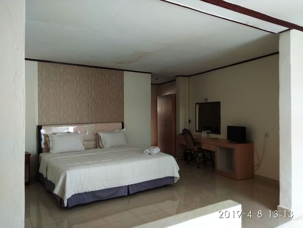 Imagen de la habitación del Hotel Maninjau Indah. Foto 7