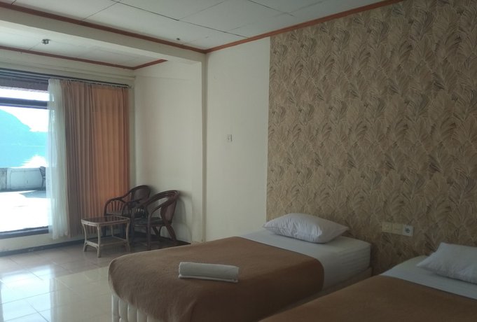 Imagen de la habitación del Hotel Maninjau Indah. Foto 11