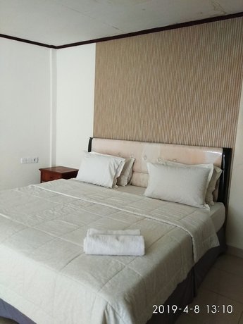 Imagen de la habitación del Hotel Maninjau Indah. Foto 15