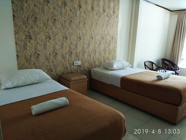 Imagen de la habitación del Hotel Maninjau Indah. Foto 17
