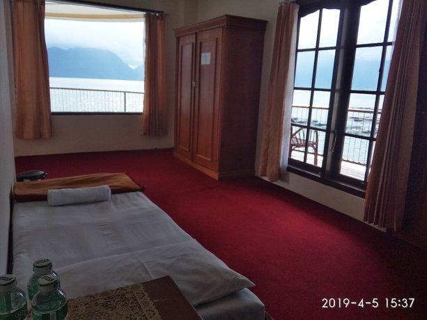 Imagen de la habitación del Hotel Maninjau Indah. Foto 19