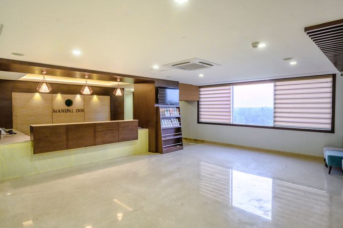 Imagen de los interiores del Hotel Manipal Inn. Foto 15