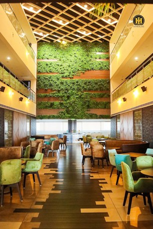 Imagen del bar/restaurante del Hotel Manipal Inn. Foto 3