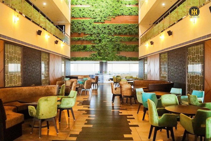 Imagen del bar/restaurante del Hotel Manipal Inn. Foto 4